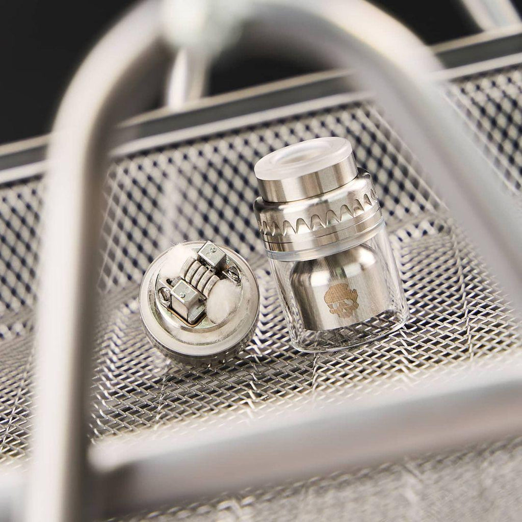 what is atomizer in vape a) Sectional scheme and (b) picture of the Cubis atomizer main image 0